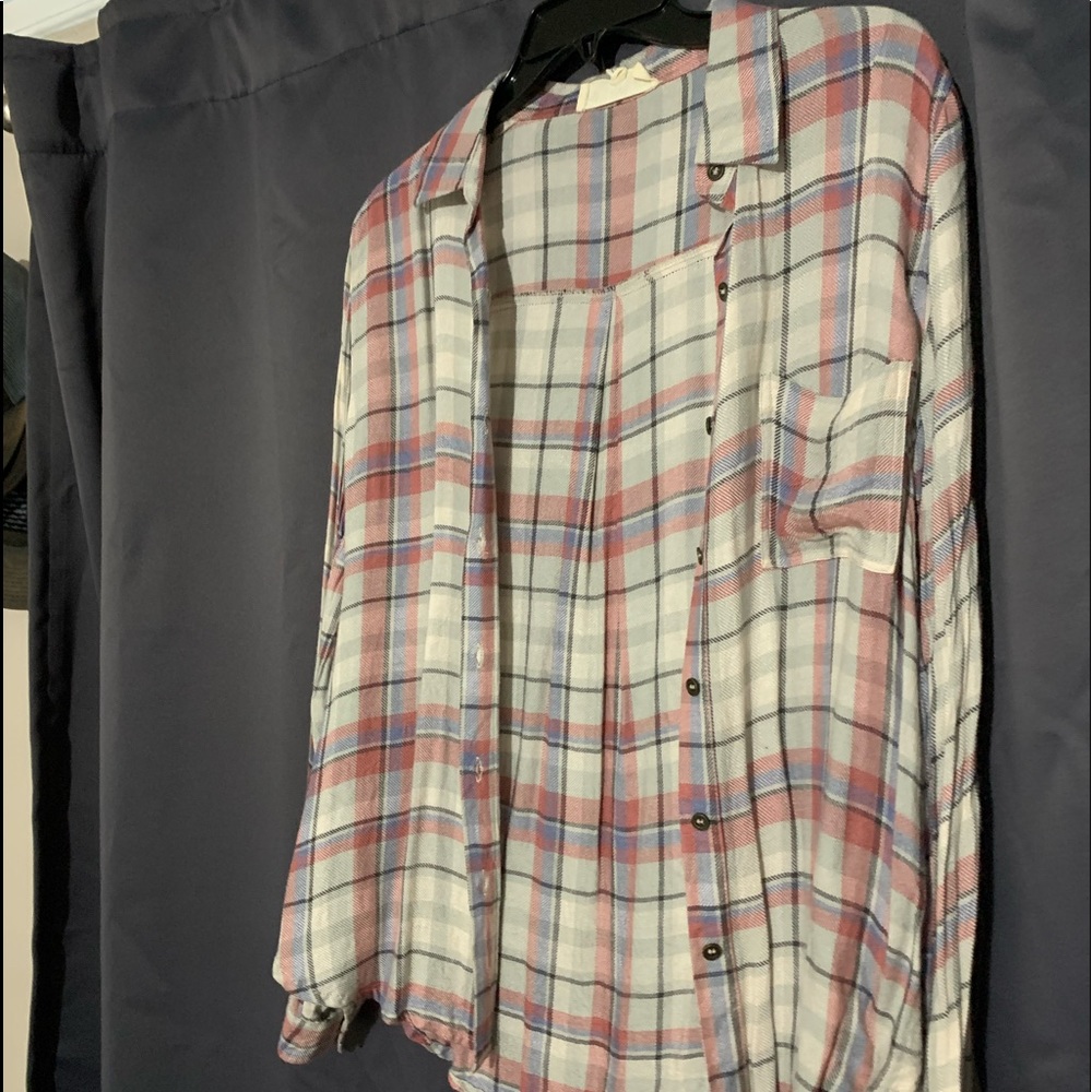 Plaid button down woman’s shirt